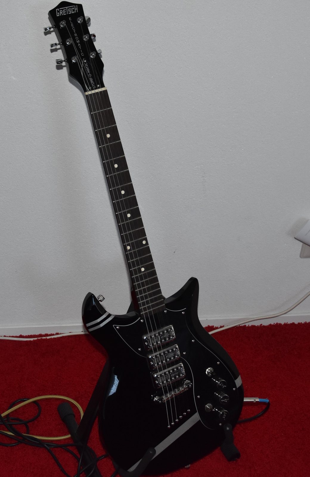 Gretsch G5135CVT-PS Patrick Stump Signature — black with triple mini-humbuckers and Corvette body