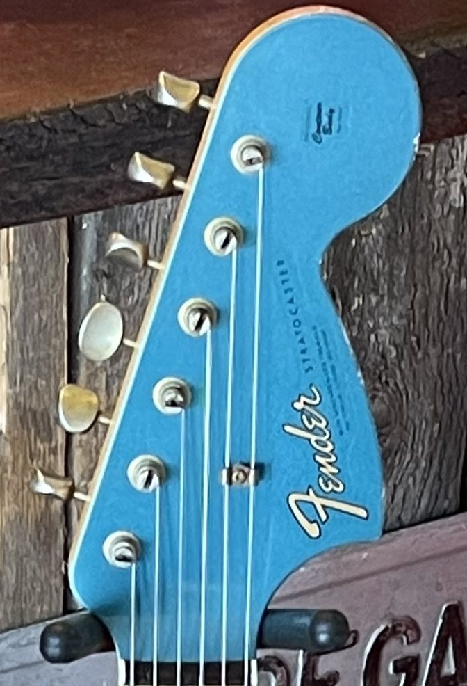 Fender Custom Shop Stratocaster — oversized headstock, blue finish with aged Fender logo and Kluson-style tuners